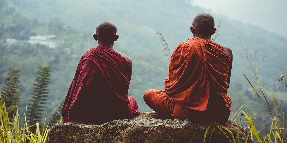 2 Monks sitting on a rock - Seattle Insight Death and Dying support group